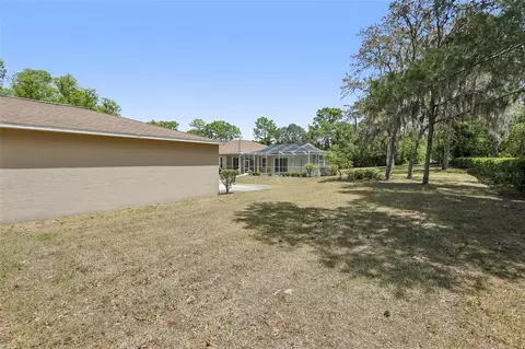 Exterior - 13185 Cooper Rd, Spring Hill, FL 34609 photo 8 of 18