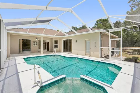 Exterior - 13185 Cooper Rd, Spring Hill, FL 34609 photo 13 of 18