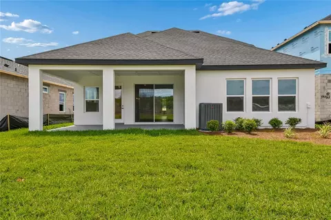 Exterior - 5693 Leaflet Trl, Mount Dora, FL 32757 photo 3 of 5