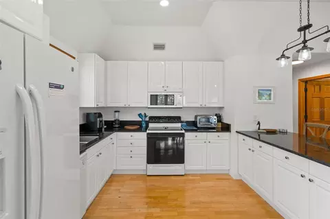 Kitchen - 1566 Indian Bay Rd, Spring Hill, FL 34607 photo 3 of 4