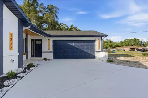 Exterior - 1215 Waterfall Dr, Spring Hill, FL 34608 photo 6 of 11