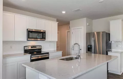 Kitchen - 12229 Tranquil Waters Ter, Parrish, FL 34219 photo 1 of 2