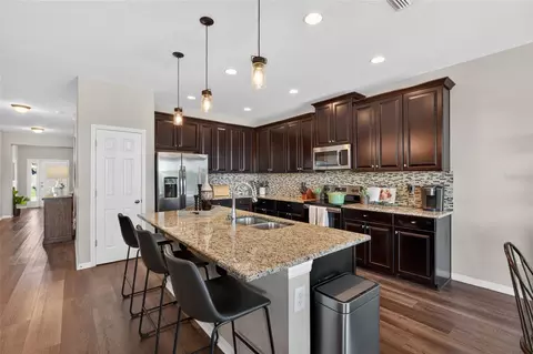 Kitchen - 18428 Malinche Loop, Spring Hill, FL 34610 photo 6 of 7
