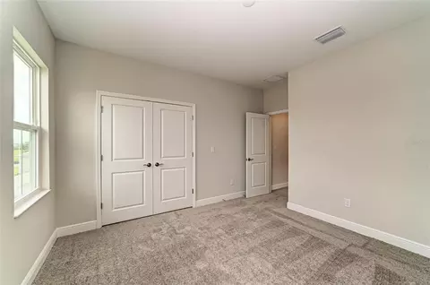 Bedroom - 10316 Longmeadow Ave, Parrish, FL 34219 photo 10 of 10