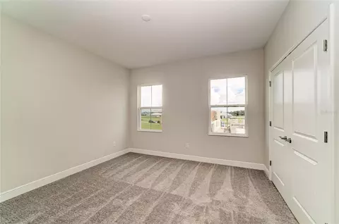 Bedroom - 10316 Longmeadow Ave, Parrish, FL 34219 photo 9 of 10