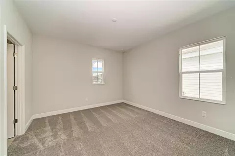 Bedroom - 10316 Longmeadow Ave, Parrish, FL 34219 photo 8 of 10