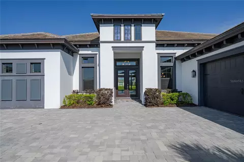 Exterior - 4866 Freccia Loop, Wesley Chapel, FL 33543 photo 3 of 7