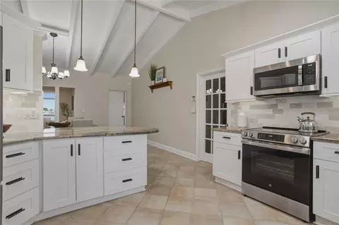 Kitchen - 324 173rd Ave E, North Redington Beach, FL 33708 photo 5 of 6