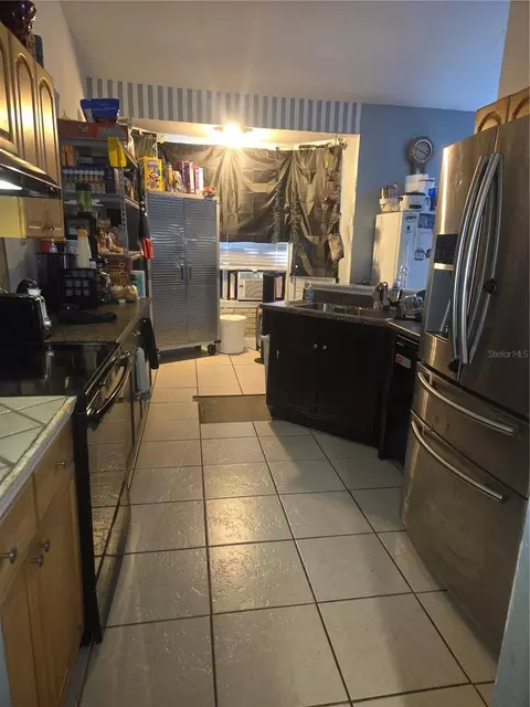 Kitchen - 7460 Herricks Loop, Orlando, FL 32835 photo 4 of 4