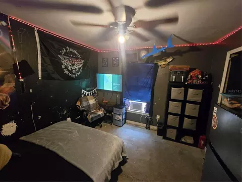 Bedroom - 7460 Herricks Loop, Orlando, FL 32835 photo 4 of 6