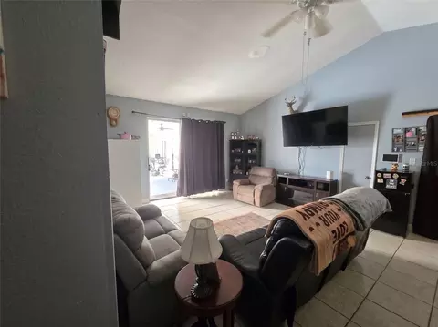 Living - 7460 Herricks Loop, Orlando, FL 32835 photo 1 of 2