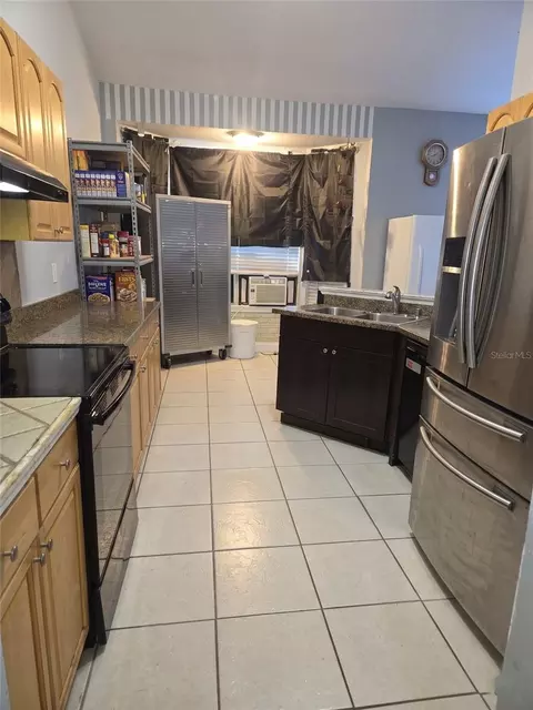 Kitchen - 7460 Herricks Loop, Orlando, FL 32835 photo 3 of 4