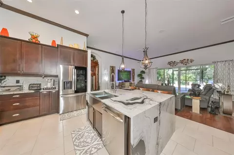 Kitchen - 6646 Park Strand Dr, Apollo Beach, FL 33572 photo 4 of 6