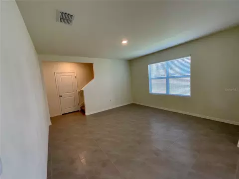 Living - 33409 Field Maple Loop, Wesley Chapel, FL 33545 photo 1 of 2