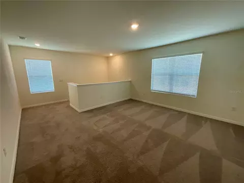 Living - 33409 Field Maple Loop, Wesley Chapel, FL 33545 photo 2 of 2