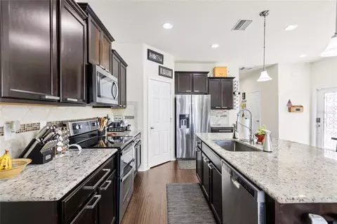 Kitchen - 8738 Turnstone Haven Pl, Tampa, FL 33619 photo 3 of 6