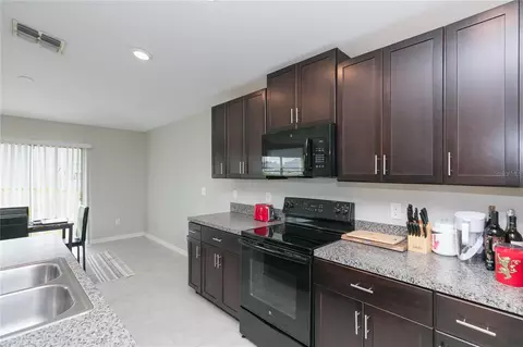 Kitchen - 13608 Willow Bluestar Loop, Riverview, FL 33579 photo 3 of 3