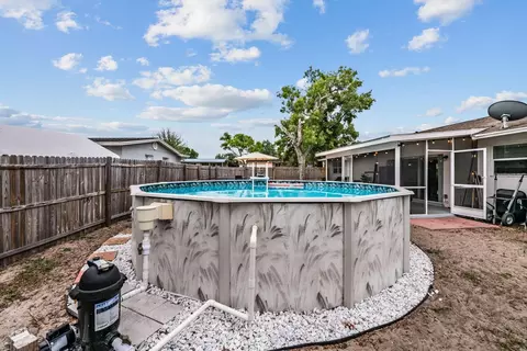 Exterior - 958 Cobblestone Dr, Spring Hill, FL 34606 photo 7 of 9