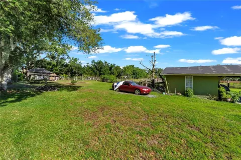 Exterior - 13610 Acker Rd, Dover, FL 33527 photo 5 of 19