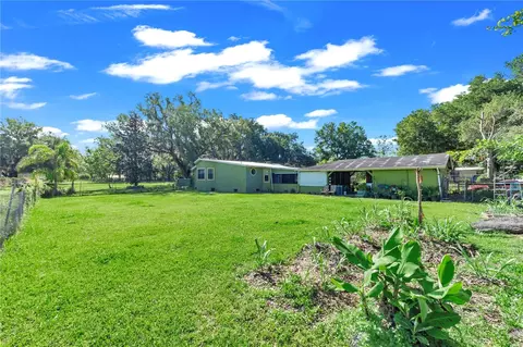 Exterior - 13610 Acker Rd, Dover, FL 33527 photo 9 of 19
