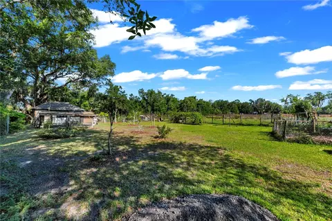 Exterior - 13610 Acker Rd, Dover, FL 33527 photo 4 of 19
