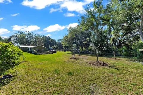 Exterior - 13610 Acker Rd, Dover, FL 33527 photo 3 of 19