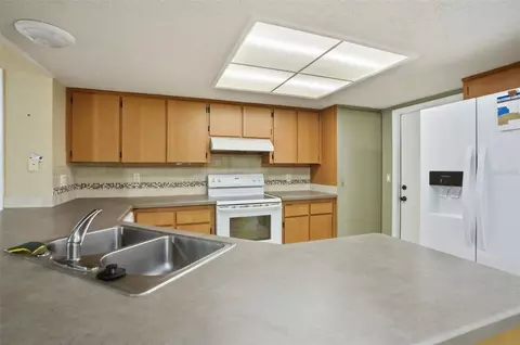 Kitchen - 136 Waterfall Dr, Spring Hill, FL 34608 photo 1 of 7