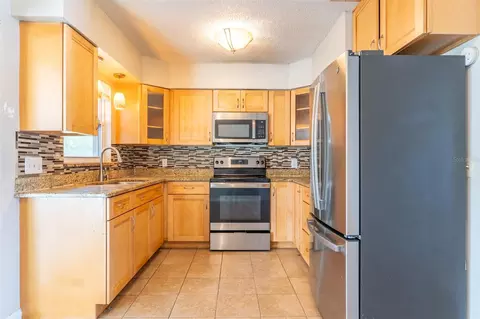 Kitchen - 614 E Wheeler Rd, Seffner, FL 33584 photo 2 of 2