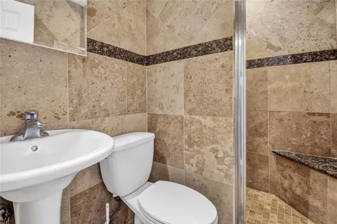 Bath - 13440 1st St E, Madeira Beach, FL 33708 photo 1 of 3