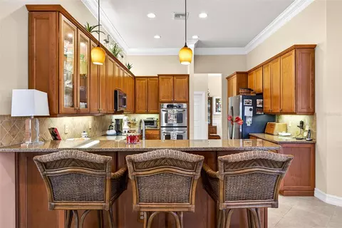 Kitchen - 5073 Ruby Flats Dr, Wimauma, FL 33598 photo 2 of 5
