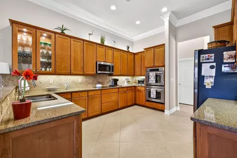 Kitchen - 5073 Ruby Flats Dr, Wimauma, FL 33598 photo 3 of 5