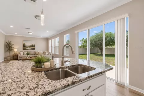 Kitchen - 1192 Multiflora Loop, Lutz, FL 33558 photo 3 of 3