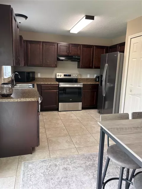 Kitchen - 176 Juniper Loop Cir, Ocala, FL 34480 photo 2 of 2