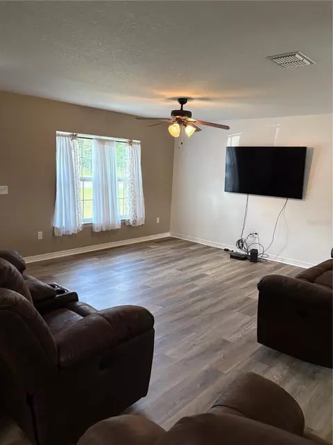 Living - 176 Juniper Loop Cir, Ocala, FL 34480 photo 1 of 3