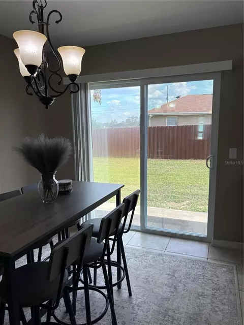 Dining - 176 Juniper Loop Cir, Ocala, FL 34480 photo 2 of 2