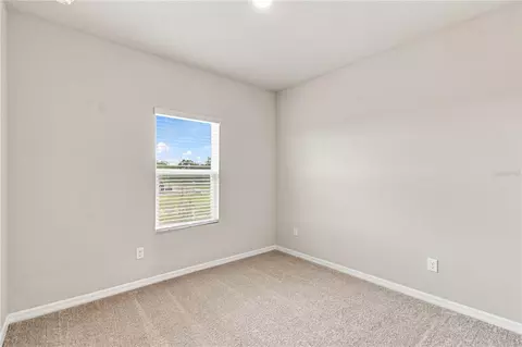 Bedroom - 5592 Coopers Hawk Ct, Saint Cloud, FL 34772 photo 4 of 7