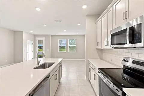 Kitchen - 5592 Coopers Hawk Ct, Saint Cloud, FL 34772 photo 3 of 5