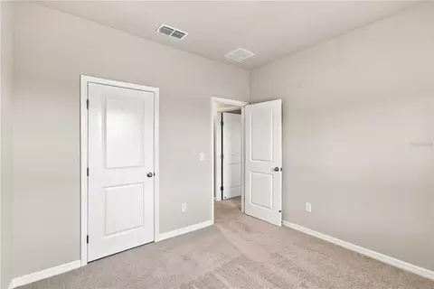 Bedroom - 5592 Coopers Hawk Ct, Saint Cloud, FL 34772 photo 7 of 7