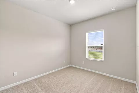 Bedroom - 5592 Coopers Hawk Ct, Saint Cloud, FL 34772 photo 6 of 7