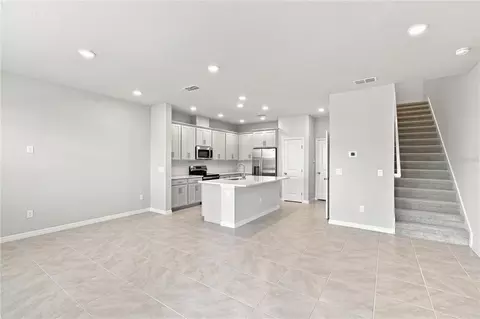 Living - 5592 Coopers Hawk Ct, Saint Cloud, FL 34772 photo 3 of 5
