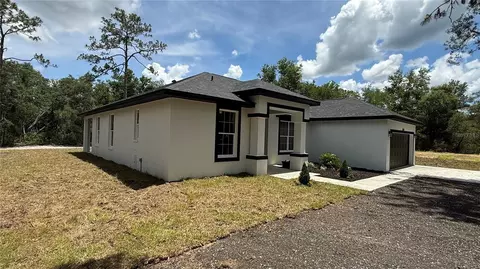 Exterior - 35031 Primrose Ln, Webster, FL 33597 photo 6 of 9