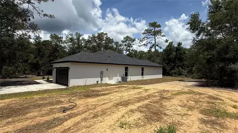 Exterior - 35031 Primrose Ln, Webster, FL 33597 photo 5 of 9