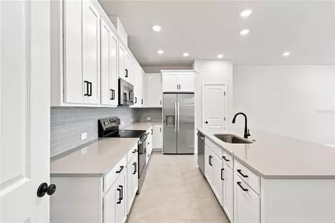 Kitchen - 5596 Coopers Hawk Ct, Saint Cloud, FL 34772 photo 4 of 7
