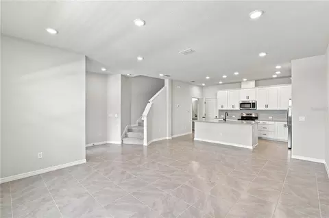 Living - 5596 Coopers Hawk Ct, Saint Cloud, FL 34772 photo 2 of 3