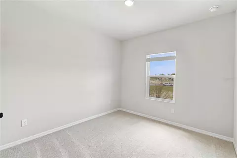 Bedroom - 5596 Coopers Hawk Ct, Saint Cloud, FL 34772 photo 5 of 6