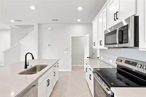 Kitchen - 5596 Coopers Hawk Ct, Saint Cloud, FL 34772 photo 7 of 7