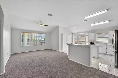 Living - 418 Henderson Ave, Seffner, FL 33584 photo 5 of 7