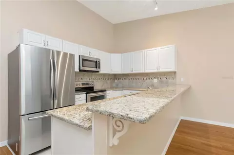 Kitchen - 3367 Crystal Ct E #E, Palm Harbor, FL 34685 photo 2 of 6