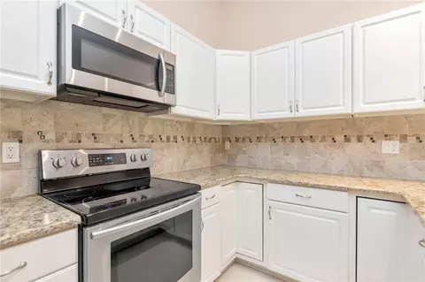 Kitchen - 3367 Crystal Ct E #E, Palm Harbor, FL 34685 photo 5 of 6