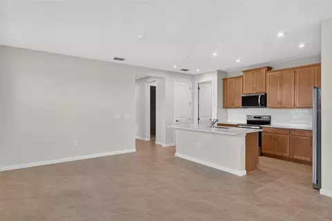 Living - 11744 Boundless Ter, Venice, FL 34293 photo 3 of 9
